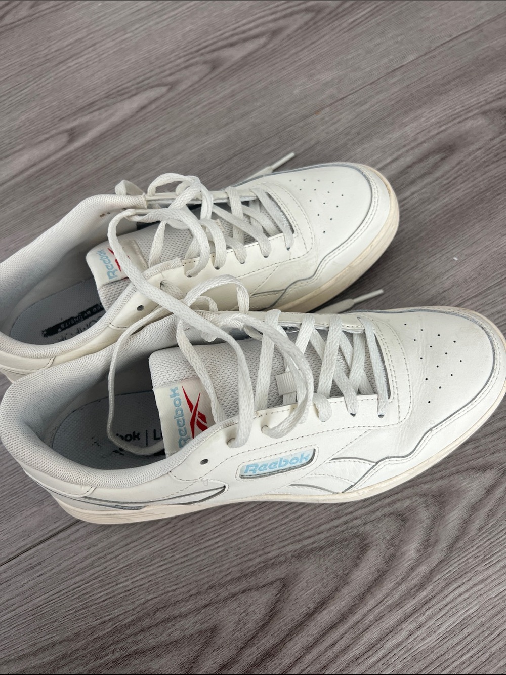 Reebok White Low-Top Leather Sneakers with Light Blue Accent